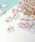 jigsaw puzzle card of gingerbread greeting card with printed card and envelope give the gift of a fun activity partially put together with other loose pieces