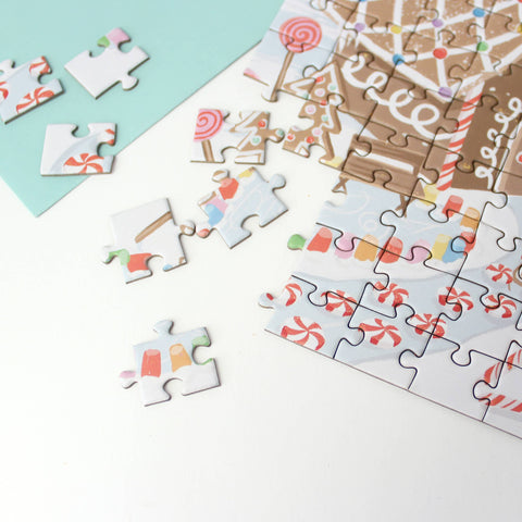jigsaw puzzle card of gingerbread greeting card with printed card and envelope give the gift of a fun activity partially put together with other loose pieces
