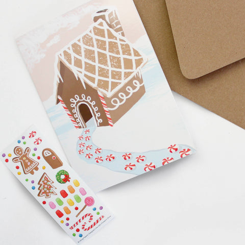 gingerbread house holiday card with candy looking stickers for decorating the gingerbread house