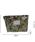 Floral-patterned pouch with dimensions on a white background