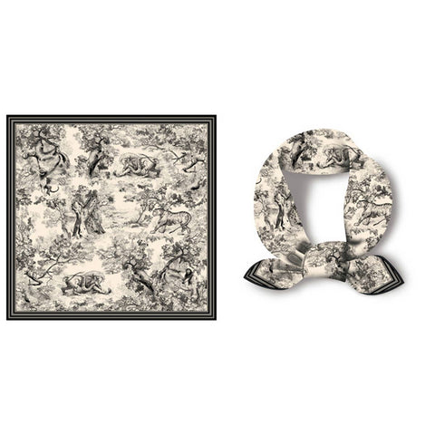 Decorative black and white scarf with vintage-style pattern on a white background. Pattern includes monkeys, trees, and other subtle jungle imagery.
